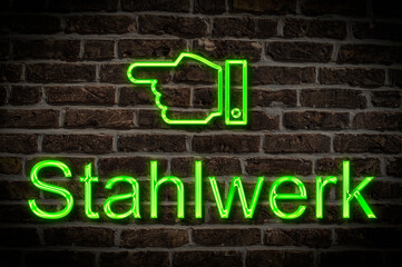 Fototapeta premium Leuchtreklame Stahlwerk