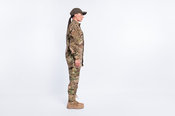 Full body profile portrait of young girl standing look empty space calm face isolated on white...