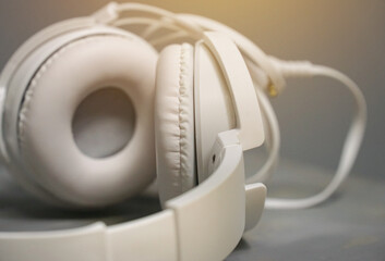 Soft and blurry Headphones for music sound. Isolated on gray background