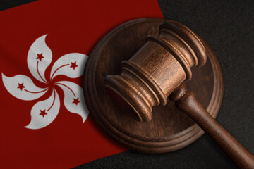 Judge gavel and flag of Hong Kong. Law and justice in Chile. Violation of rights and freedoms