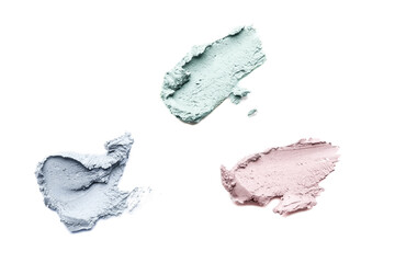 Smears of cosmetic clay isolated on a white background.