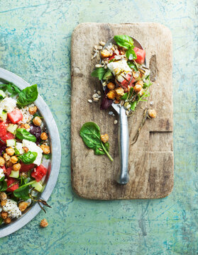 Vegetarian salad on wooden board