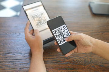 Qr code payment. E wallet. Man scanning tag accepted generate digital pay without money.scanning QR...