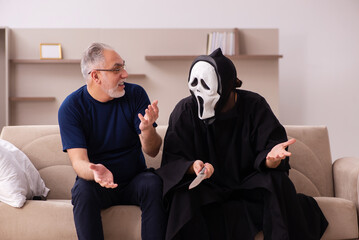 Devil visting old dying man at home