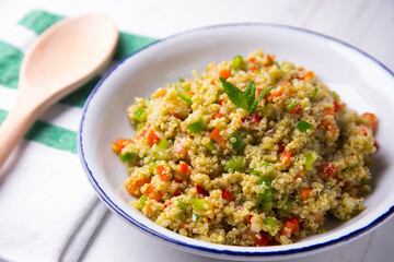 Quinoa salad with vegetables and mint oil