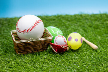 Baseball for Easter Holiday with Easter eggs in basket 