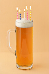 Closeup Pint Of Beer Birthday With Candles