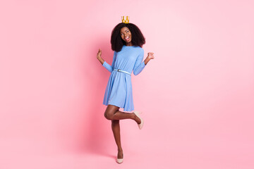 Photo of adorable girl prom dance look empty space wear crown mini dress high-heels isolated pink...