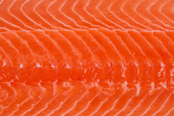 Background of fish flesh of salmon fillet close-up