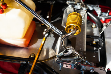 Anodized yellow Steel Brake Pedal On A Competition Go Kart
