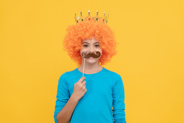 cheerful selfish child girl in curly wig and princess diadem wear party moustache, party