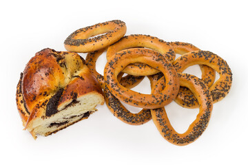Sushki cookies topped with poppy seeds and poppy seed roll