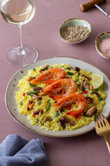 Spanish paella with seafood, shrimp and vegetables. Healthy eating. Spanish cuisine.