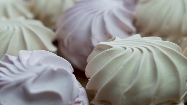 Delicious Marshmallows Close-up, Isolated, Rotation. Background of Sweets, Marshmallows. Yummy.