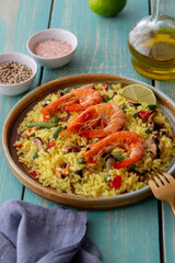 Spanish paella with seafood, shrimp and vegetables. Healthy eating. Spanish cuisine.