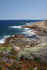 waves crashing on rocks