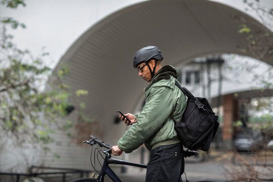 Bicycle courier using cell phone