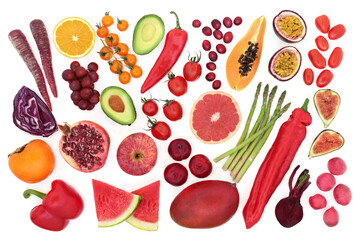 Fruit & vegetable collection very high in lycopene found in many red, purple, orange & many other fruits & vegetables. Foods also high in antioxdants, vitamins, fibre, minerals & fibre. Flat lay on w