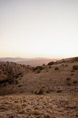 Man mountain landscape. Concept of peace at sunset