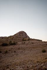 Man mountain landscape. Concept of peace at sunset