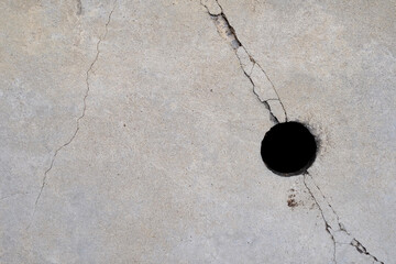 crack concrete pipe cap of drain cover with hole - obrazy, fototapety, plakaty