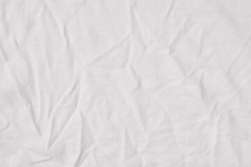 Fototapeta na wymiar Crumpled white fabric cloth texture