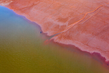 Aerial view of a reservoir full of red toxic sludge. Hungary - red mud storage