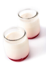 Panna cotta dessert with strawberry isolated on white background