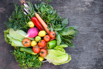 Organic vegetables on wooden background	