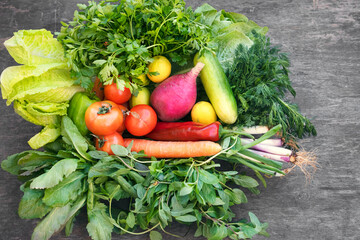 Organic vegetables on wooden background	
