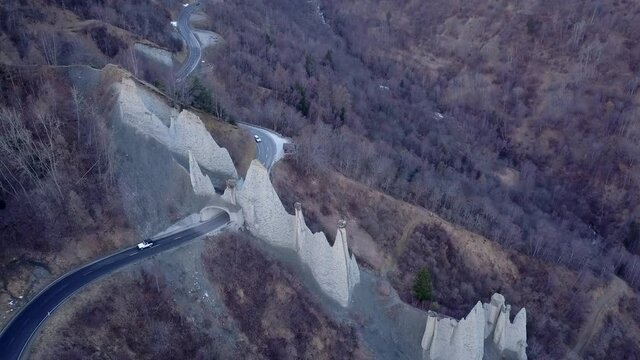Drone shot of Euseigne pyramids in Switzerland. Aerial rising