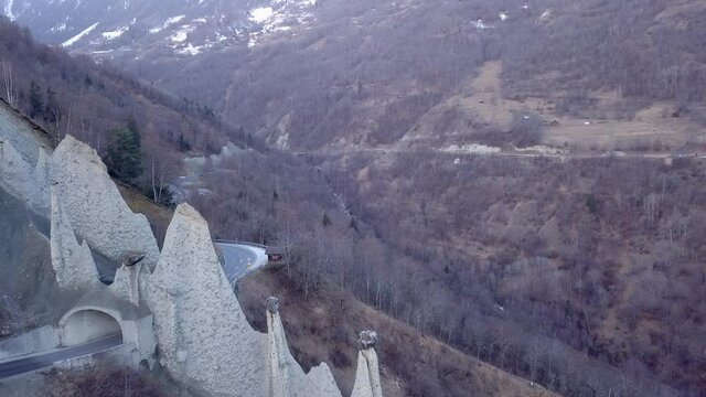 Fairy chimneys or Euseigne Pyramids, Swiss Alps. Aerial forward