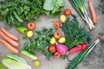 Organic vegetables on wooden background	