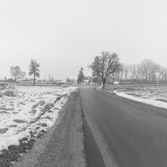 Obraz premium Polaky, Czech republic - February 21, 2021: way to village in winter