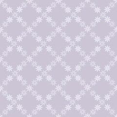 Pattern of lozenges of watercolor flowers on a lilac background