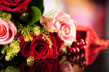 Bunch of roses on the bokeh background. Women’s day gift. 