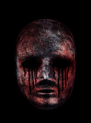 Creepy bloody mask isolated on black with clipping path