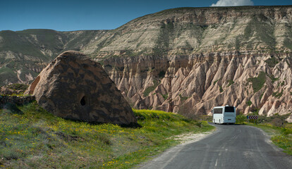 A travel touristic bus driving on the roads from Cappadocia in Turkey