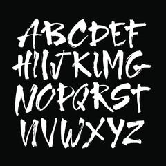 Vector Acrylic Brush Style Hand Drawn Alphabet Font. Calligraphy alphabet on a black background