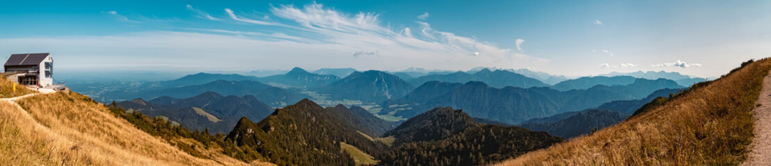 Fototapeta premium High resolution stitched panorama of a beautiful alpine autumn or indian summer view at the famous Hochfelln summit, Bergen, Bavaria, Germany