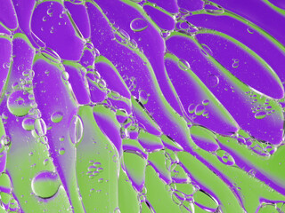 abstract background oil drops on water macro orange