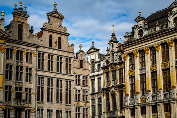 Fototapeta na wymiar Brussels, Belgium - July 13, 2019: Medieval gothic architecture of buildings around Grand Place square of Brussels