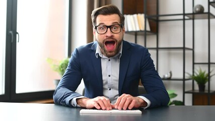 Successful lucky young bearded businessman in formal wear raised fists up celebrating success, screaming yes, passed test with high score, got promoted, won lottery, closed a deal. Victory concept - Powered by Adobe