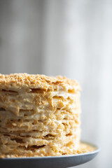 Homemade multilayers cake Napoleon with custard. Close up view.