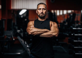 Fototapeta na wymiar Portrait of man in the gym. Healthy lifestyle