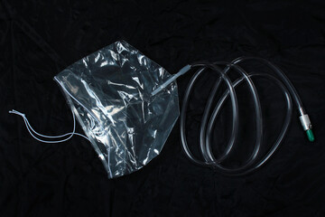 Disposable oxygen mask for use in an airplane