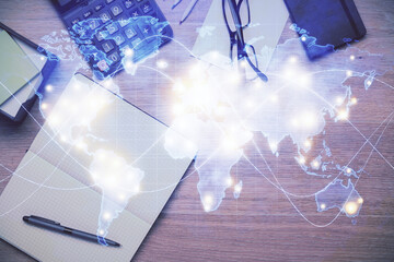 Multi exposure of business theme drawing and work table top veiw. Concept of international finance.