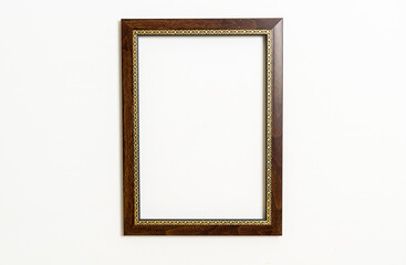 empty picture frame on white wall background