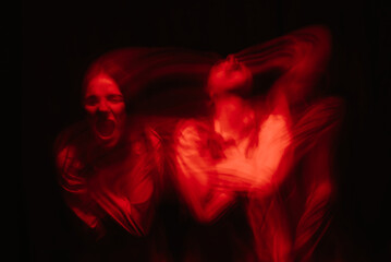 blurry portrait of a psychopathic girl with schizophrenic mental disorders