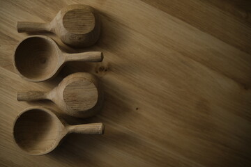 wooden spoons on a wooden table.Brown natural background. Ancient Japanese culture. Retro style....